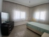 Gazimağusa Yeni Boğaziçi'nde Eşyalı 3+1 Daire Kiralık - Bahçe ve Otopark İmkanıyla
