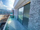 SIFIR 1 YATAK ODASI 1 BANYO DENİZ MANZARALI DAİRE, BAHÇELİ'DE ÖZEL ÇATI TERASI VE BİRÇOK OLANAK