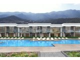 SIFIR 1 YATAK ODASI 1 BANYO DENİZ MANZARALI DAİRE, BAHÇELİ'DE ÖZEL ÇATI TERASI VE BİRÇOK OLANAK