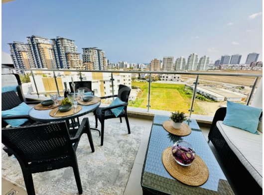 İskele Long Beach'te Eşyalı 1+1 Daire - Şehir ve Deniz Manzarası ile Satılık!