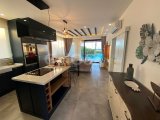 BAHÇELİ'NDE TROPİK STİLİNDE KONUMLANMIŞ, ÖNÜ DENİZ MANZARALI 4 YATAK ODALI BUNGALOV + ÇATI TERRAS VE ÖZEL HAVUZ
