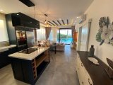 4 YATAK ODALI SAHİLDEKİ BUNGALOV + ÇATI TERRAS VE TROPİKAL TARZDA BAHÇELİ'DE ÖZEL HAVUZLU TATİL KÖYÜNDE