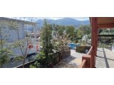 ALSANCAK'ta Eşsiz 4 Yatak Odalı 4 Banyolu Ahşap Çerçeveli Villa