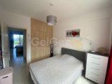 GÜZEL 2 YATAK ODALI 1 BANYO BAHÇE DAİRESİ DENİZ MANZARALI - ESENTEPE