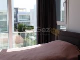 BOĞAZ'DA SAHİLDEKİ SİTE İÇİNDE MUHTEŞEM 2 YATAK ODALI ÇATI KATI DAİRESİ