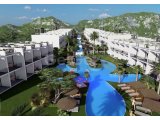 5 YILDIZLI BAHAMAS TATİL KÖYÜNDE BULUNAN YEPYENİ, DENİZ MANZARALI 2 YATAK ODALI ÇATI KAT DAİRESİ