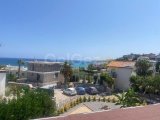 BAHÇELI'DE 'A MÜSTAKIL 3 YATAK ODALI, 3 BANYOLU VILLA, GENIŞ BAHÇE, JAKUZI, DENIZ MANZARASI VE ORTAK HAVUZ
