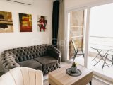 BAFRA'DA DENİZ KENARINDAKİ BİR TATİL KÖYÜNDE AKILLI STÜDYO DAİRE 87.000 £ - OC0005