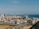 LONG BEACH'TEKİ İLK 7 YILDIZLI TATİL KÖYÜNÜN 21. KATINDA 2 YATAK ODALI DAİRE 255.000 £