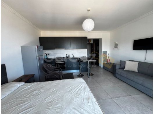 İSKELE LONG BEACH FULL DENİZ MANZARALI FUL EŞYALI 6. KAT HAVUZLU SİTEDE KİRALIK STUDİO DAİRE