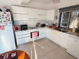 GİRNE, ALSANCAK – MİLOS PARK’TA SATILIK BAHÇELİ 2+1 DAİRE