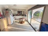 GİRNE, ALSANCAK – MİLOS PARK’TA SATILIK BAHÇELİ 2+1 DAİRE