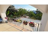GİRNE, ALSANCAK – MİLOS PARK’TA SATILIK BAHÇELİ 2+1 DAİRE