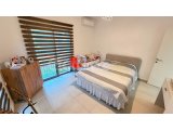 GİRNE, ALSANCAK – MİLOS PARK’TA SATILIK BAHÇELİ 2+1 DAİRE