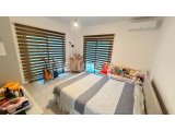 GİRNE, ALSANCAK – MİLOS PARK’TA SATILIK BAHÇELİ 2+1 DAİRE