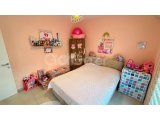 GİRNE, ALSANCAK – MİLOS PARK’TA SATILIK BAHÇELİ 2+1 DAİRE