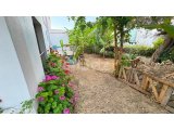 GİRNE, ALSANCAK – MİLOS PARK’TA SATILIK BAHÇELİ 2+1 DAİRE