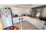 GİRNE, ALSANCAK – MİLOS PARK’TA SATILIK BAHÇELİ 2+1 DAİRE