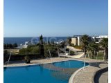 Satılık - Palm Bay Manzaralı, Bahçeli | Modern 1+1 Daire | £99,500 (Tapu Hazır!)