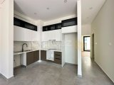 KIBRIS GIRNE ALASANCAK BOLGESINDE, YÜZME HAVUZLUŞ, EŞYASIZ 2+1 DAIRE SATILIKTIR