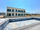KIBRIS GIRNE ALSANCAK BÖLGESINDE, YÜZME HAVUZLU LÜKS 3+1 YENI VILLA SATILIKTIR