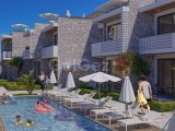 Girne Alsancak'ta Dağ ve Deniz Manzaralı Satılık 1+1 ve 2+1 Daireler