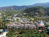 Girne Alsancak'ta Dağ ve Deniz Manzaralı Satılık 1+1 ve 2+1 Daireler