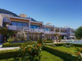 Girne Alsancak'ta Dağ ve Deniz Manzaralı Satılık 1+1 ve 2+1 Daireler