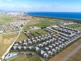 İskele, Long Beach, La İsla Villas sitesinde satılık 5+1 villa. Teslime Hazır