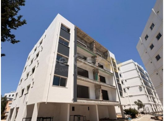Magusa canakkale bölgesinde 2+1 eşyasız satılık daire 1 ay sonra teslim 85 m2 80.000 pound 3.katta 5 katlı asansörlü