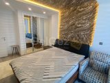 Girne'de Eşyalı 2+1 Daire, Özel Havuz ve Şehir Manzarası ile Satılık!
