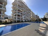 Girne'de Eşyalı 2+1 Daire, Özel Havuz ve Şehir Manzarası ile Satılık!