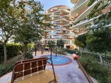 Girne'de Eşyalı 2+1 Daire, Özel Havuz ve Şehir Manzarası ile Satılık!