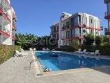 ALSANCAK'TA, ATAKARA SÜPERMARKET YANINDA, ÇOK İYİ KONUMDA, 80 (METREKARE), ORTAK HAVUZLU,BAKIMLI SİTE İÇERİSİNDE, DAĞ VE DENİZ MANZARALI, 2+1, FUL EŞYALI, Ç