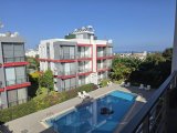 ALSANCAK'TA, ATAKARA SÜPERMARKET YANINDA, ÇOK İYİ KONUMDA, 80 (METREKARE), ORTAK HAVUZLU,BAKIMLI SİTE İÇERİSİNDE, DAĞ VE DENİZ MANZARALI, 2+1, FUL EŞYALI, Ç