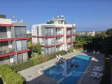 ALSANCAK'TA, ATAKARA SÜPERMARKET YANINDA, ÇOK İYİ KONUMDA, 80 (METREKARE), ORTAK HAVUZLU,BAKIMLI SİTE İÇERİSİNDE, DAĞ VE DENİZ MANZARALI, 2+1, FUL EŞYALI, Ç