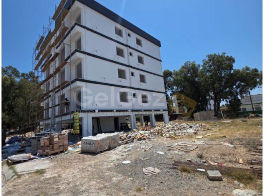 Gazimağusa Çanakkale Mahallesinde 2+1 % 35 peşinat 1 aya teslim geç otur kira öder gibi öde kdv trafo hediye ayda 1000 stg taksit imkanı satılık daire