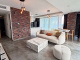 GİRNE DOĞANKÖY’DE ORTAK HAVUZLU, JENERATÖRLÜ SİTEDE FULL EŞYALI KİRALIK 2+1 DAİRE
