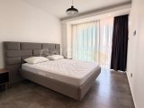 GİRNE DOĞANKÖY’DE ORTAK HAVUZLU, JENERATÖRLÜ SİTEDE FULL EŞYALI KİRALIK 2+1 DAİRE